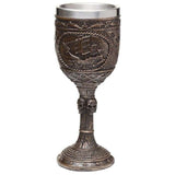 Set of 2 decorative pirate goblets in brushed gold wood effect, ideal for themed decor and display purposes.