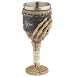 Decorative skeleton arm goblet, 19cm tall, crafted from resin and stainless steel, perfect for gothic decor and Halloween events.