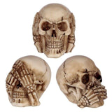 Set of 3 small skull ornaments embodying 'see no evil, hear no evil, speak no evil' theme, perfect for gothic decor.