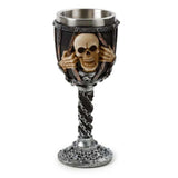 Decorative skull goblet with chains, 18.5cm tall, resin and stainless steel, ideal for gothic decor and themed events.