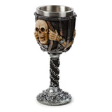 Decorative skull goblet with chains, 18.5cm tall, made of resin and stainless steel, perfect for gothic decor and themed events.