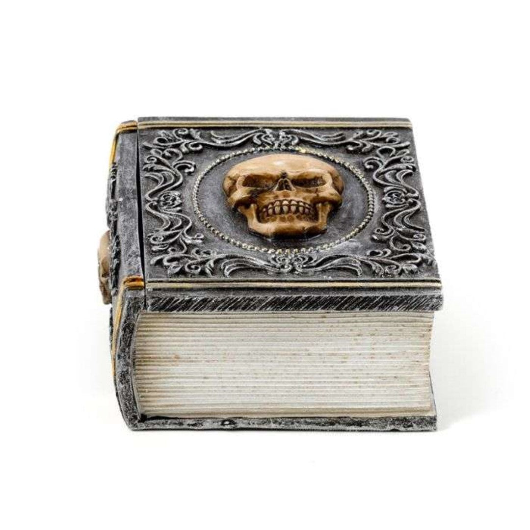 Skull-embellished book-shaped trinket box, 11cm, perfect for stylishly storing jewelry and collectibles with gothic charm.