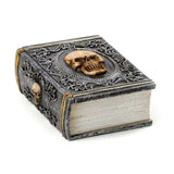 Gothic skull embellished trinket box shaped like a book, perfect for storing jewelry and collectibles, measuring 11cm long.