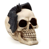 Ornament featuring a detailed skull with hollow eyes and a bat, perfect for spooky Halloween decor and gothic themes.