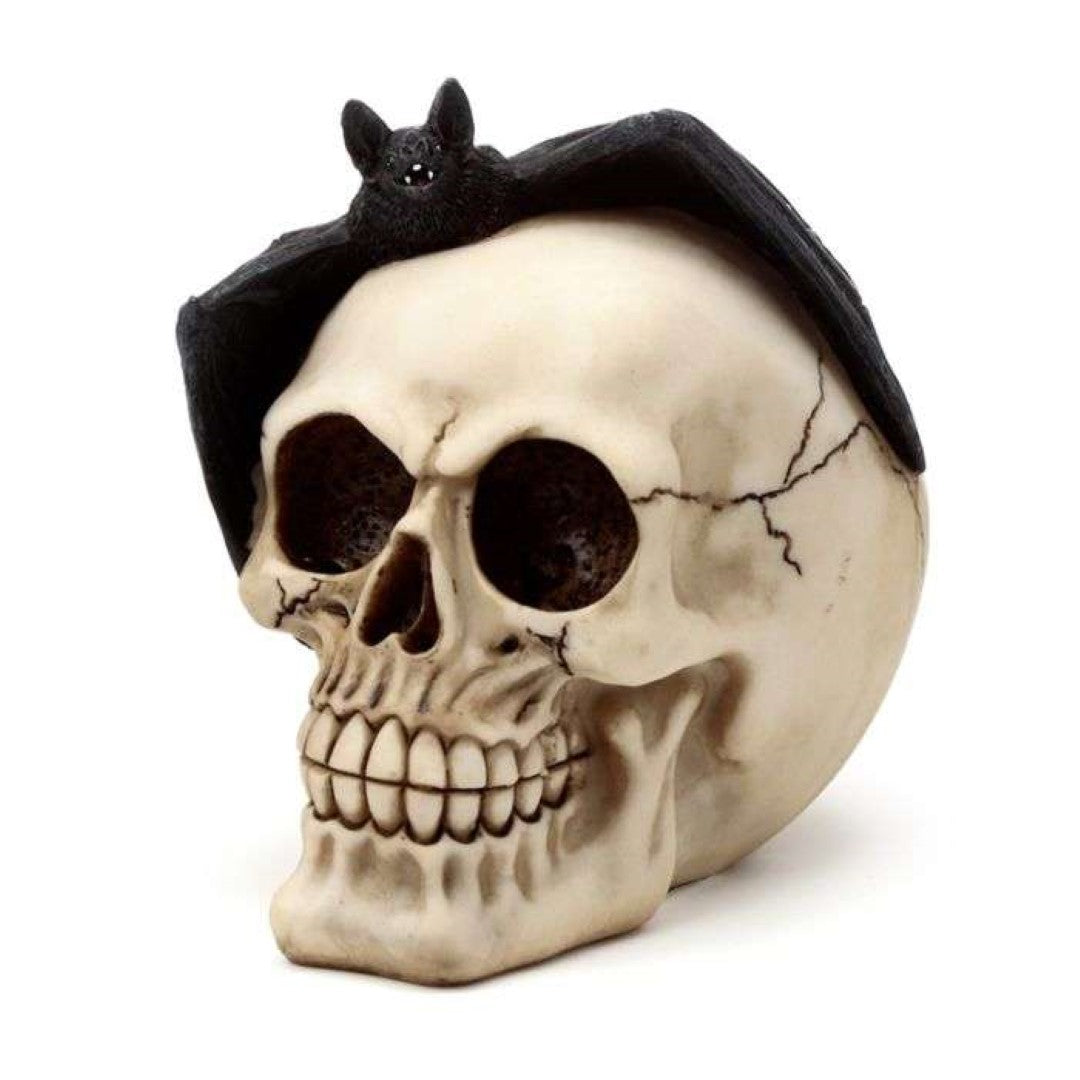 Gruesome skull head ornament with bat, 15cm tall, perfect for Halloween and gothic décor enthusiasts.