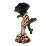 Skeleton hand holding a black rose, 17cm tall, perfect for gothic decor or Halloween celebrations.