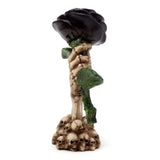 Gothic ornament of a skeleton hand grasping a black rose, 17cm tall, ideal for Halloween decor or stylish table centerpiece.