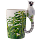 Ceramic mug featuring a playful lemur design and jungle decal, ideal for nature lovers and perfect for gifting.