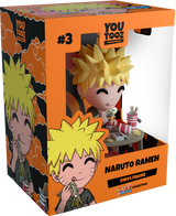 Naruto collectible figurine enjoying ramen, dressed casually, with chopsticks and a messy hairdo, set on a table with snacks.