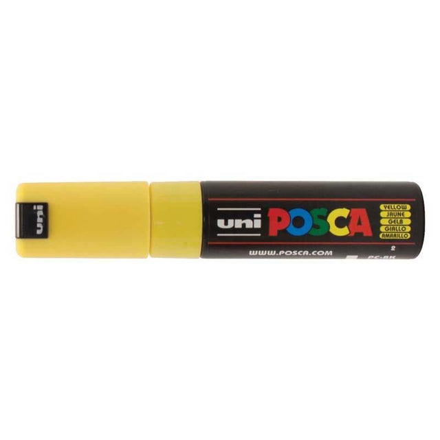 Uni Posca Marker in vibrant yellow, featuring a bold chisel nib for precise strokes and broad coverage on various surfaces.