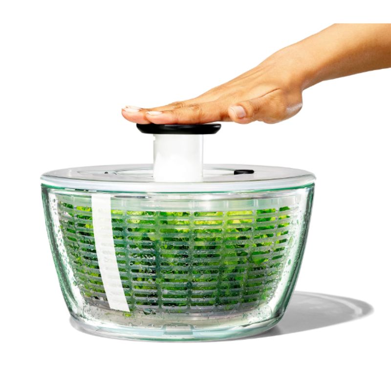 OXO Good Grips Glass Salad Spinner with glass bowl, non-slip knob, and dual function as a colander for easy salad preparation.