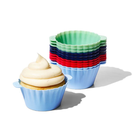 Vibrant OXO silicone baking cups in assorted colors, perfect for cupcakes and snacks, featuring non-stick and easy-lift design.