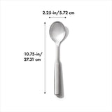 Durable stainless steel serving spoon with deep well design and non-slip handle for effortless scooping and serving.