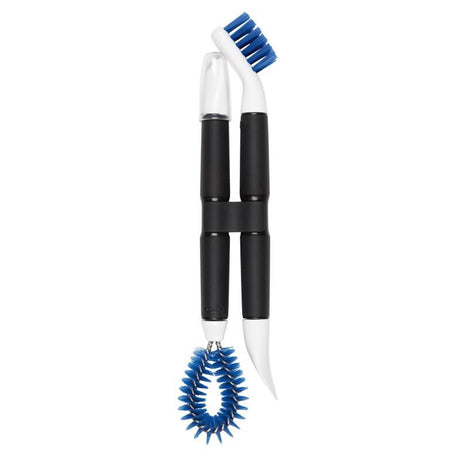 Image of OXO Good Grips Kitchen Appliance Cleaning Set, featuring brushes and scrapers for deep cleaning kitchen fixtures and appliances.