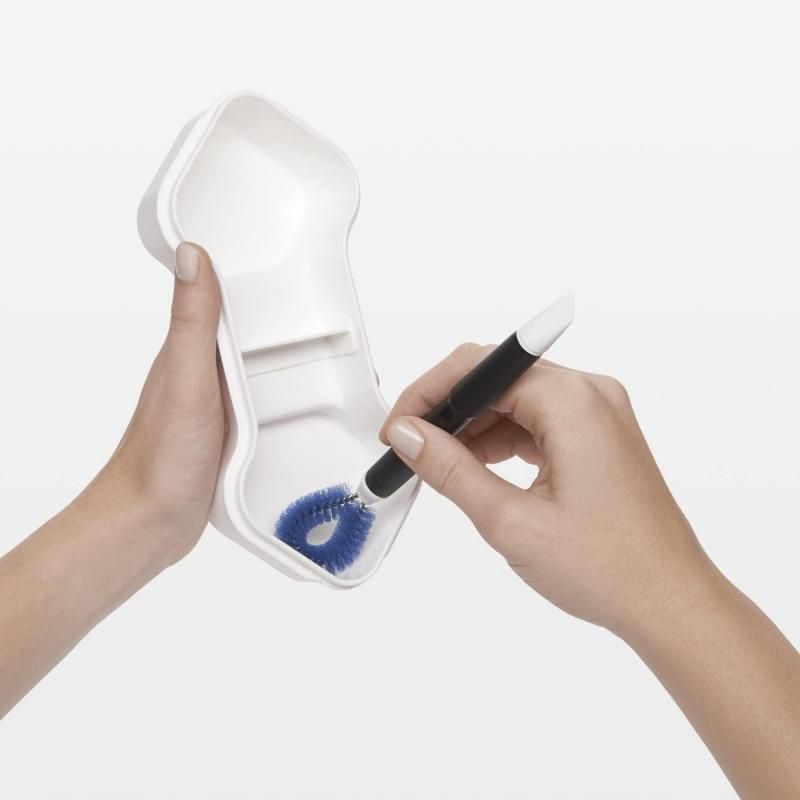 OXO Good Grips Kitchen Appliance Cleaning Set with durable brushes and scrapers for deep cleaning tight spaces in appliances.