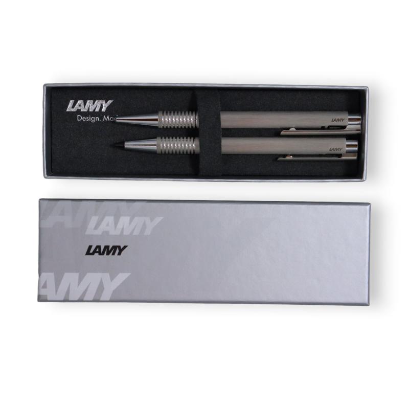 Lamy Logo Gift Set 106/206 features a brushed stainless steel mechanical pencil and ballpoint pen, elegantly packaged for gifting.