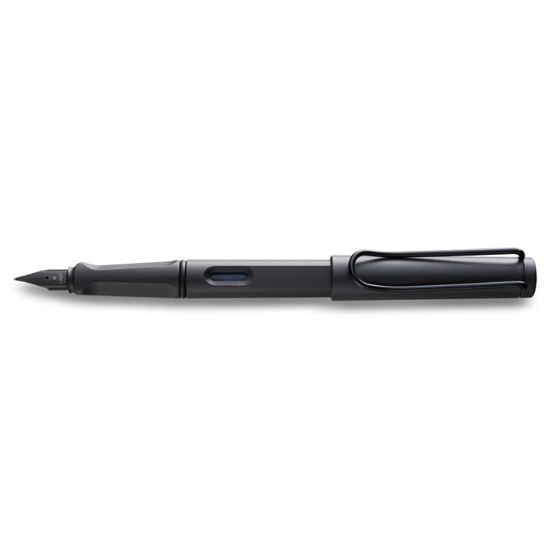 Lamy Fountain Pen Gift Set in matte charcoal, featuring polished steel nib, ink bottle, and blotting paper for elegant writing.