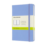 Moleskine Pocket Notebook in Hydrangea Blue, featuring ivory pages, elastic closure, and expandable pocket for notes.