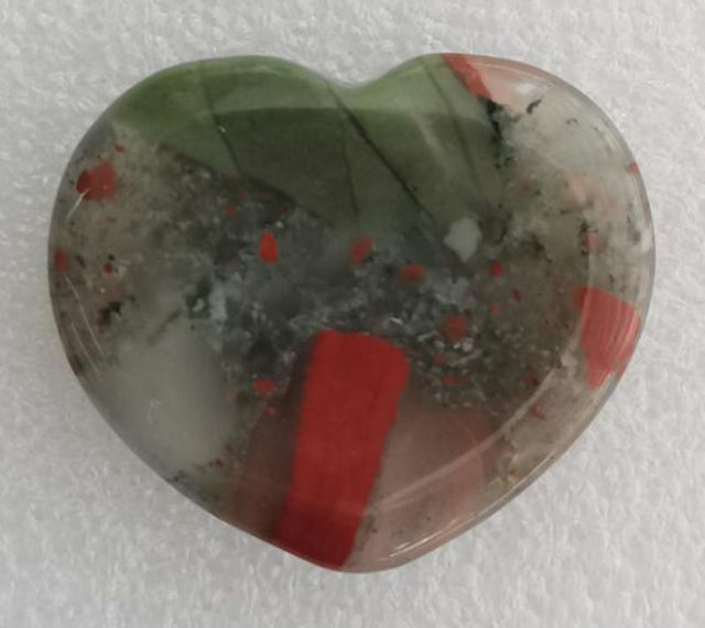 Polished 4cm African Bloodstone heart, perfect for stress relief and meditation, promoting emotional balance and mindfulness.