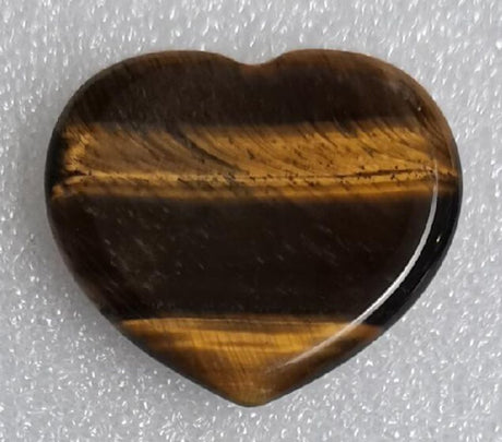 Tiger Eye Heart Worry Stone (4cm) - a smooth, palm-sized crystal for stress relief and mindfulness, featuring golden-brown hues.