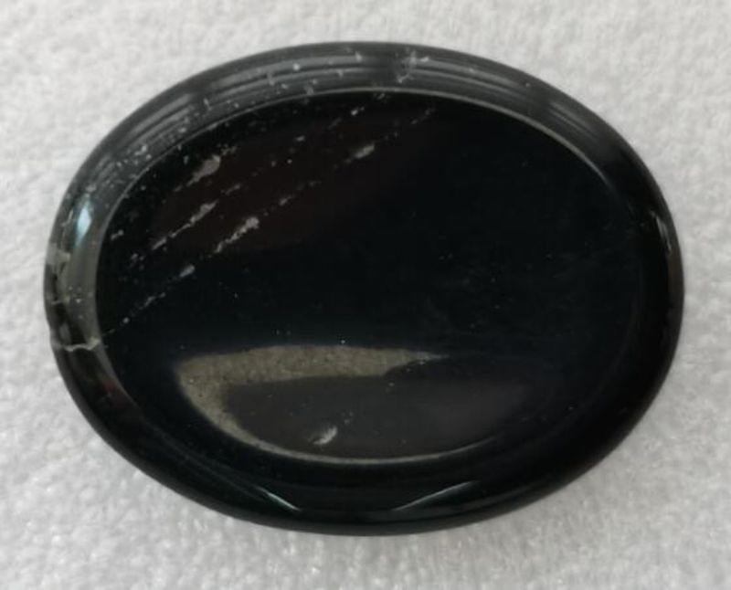 Obsidian worry stone, 4.5 cm, smooth surface for stress relief, mindfulness, and emotional healing. Perfect for meditation.