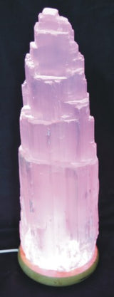Selenite lamp with USB connection, emits a warm glow for peaceful ambiance, ideal for relaxation and decor.