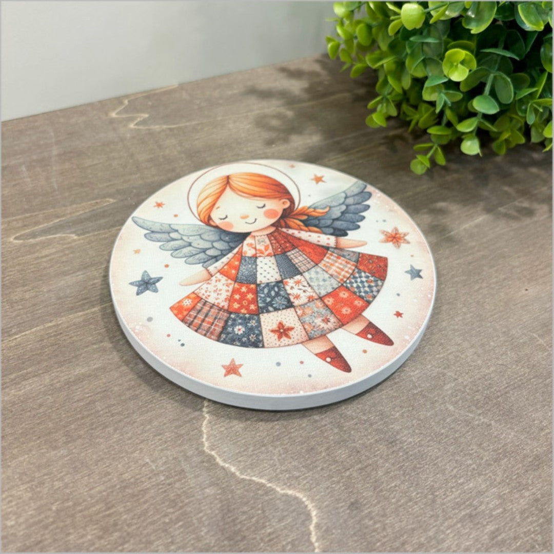 Canvas wall art featuring a whimsical angel design in a small 150mm diameter circle, ready to hang and add charm to your decor.