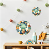 Canvas circle wall art featuring a playful patchwork dinosaur design, perfect for children's rooms, measuring 150mm in diameter.