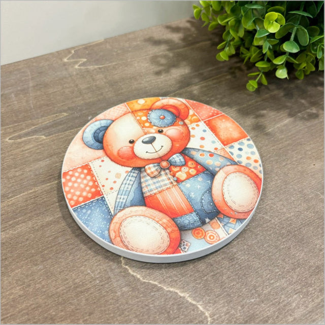 Canvas circle featuring a playful patchwork bear design, perfect for children's room decor, measuring 150mm in diameter.