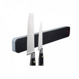 Bisbell Magnetic Knife Rack 300mm in black, featuring soft rubberized texture and strong rare earth magnets for a playful kitchen display.