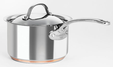 Elegant Chasseur Le Cuivre 2.6L saucepan with lid, featuring a copper core for quick heating and superior heat distribution.