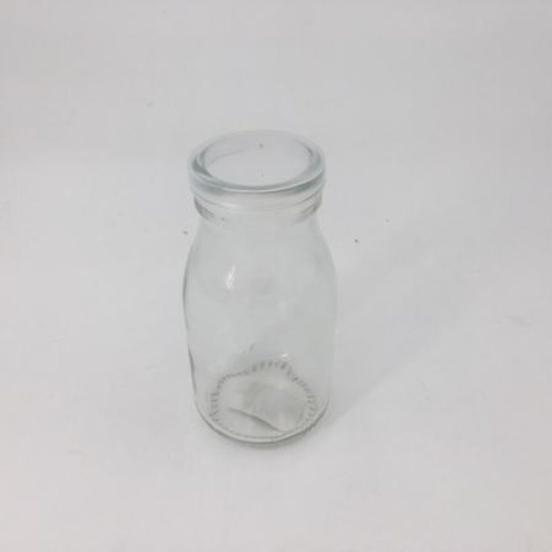 Set of 12 elegant 180ML glass bottles with lids for meal prep, storage, and gifting, eco-friendly and durable design.