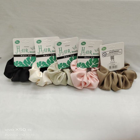 A set of 12 colorful, stretchy hair ties designed for all hair types, ensuring secure and stylish hairstyles without breakage.