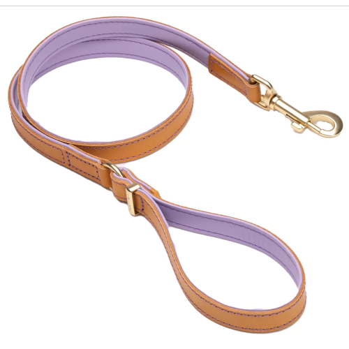 Padded lilac leather dog leash with brushed gold hardware, 100cm long, blending comfort and style for all dogs.