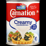 Nestle Carnation Creamy Evaporated Milk Can (340ml) for rich, low-fat cooking and baking with creamy texture and flavor.