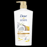 Dove Restoring Ritual Shampoo 820ml, enriched with coconut oil and turmeric, nourishes and repairs damaged hair for vibrant shine.