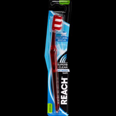 Reach Between Medium Toothbrush with multi-level bristles for effective plaque removal and gentle gum protection.