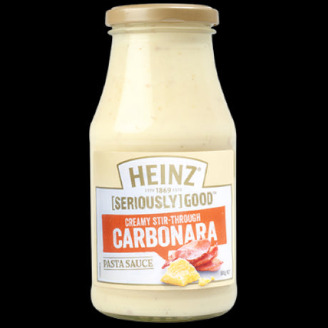 Creamy Heinz Seriously Good Carbonara Pasta Sauce with bacon, perfect for quick dinners or gourmet meals at home.