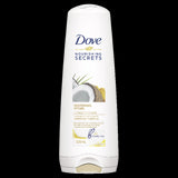 Dove Restoring Ritual Conditioner 320ml, enriched with coconut oil and turmeric for nourishing and revitalizing damaged hair.