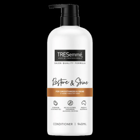 TRESemmé Restore & Shine Conditioner in a 940ml bottle for vibrant, healthy, and moisturized hair, PETA approved and eco-friendly.