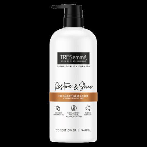 TRESemmè Restore & Shine Conditioner 940ml, a moisturizing formula for vibrant, healthy hair, free from parabens and dyes.