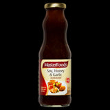 Bottle of Masterfoods Honey Soy Marinade 375g, featuring a blend of honey, soy, and garlic for savory Asian flavor.