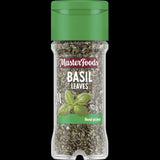 Dried Masterfoods Basil Leaves in a glass shaker jar, offering sweet, spicy aroma for enhancing various dishes.