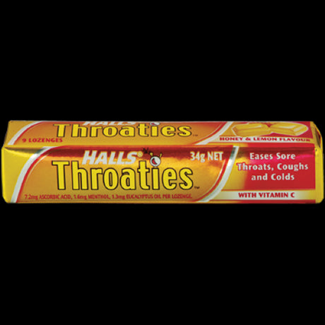 Halls Throaties Honey & Lemon Lozenges in a 34g stick pack, providing soothing relief for throats with a sweet citrus flavor.