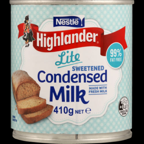 Nestle Highlander Lite Sweetened Condensed Milk Can 410g, a 99% fat-free treat for delicious low-calorie desserts.