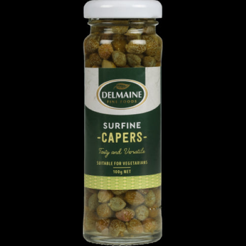 Delmaine Surfine Capers 100g, premium briny buds for enhancing Mediterranean and gourmet dishes with rich flavor.