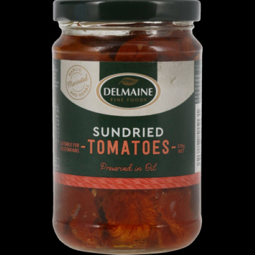 Delmaine Sundried Tomatoes in oil, rich ruby red, packed with Mediterranean flavors, perfect for enhancing various dishes.