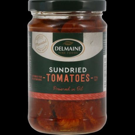 Delmaine Sundried Tomatoes in oil, rich ruby red, packed with Mediterranean flavors, perfect for enhancing various dishes.