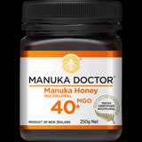 Manuka Doctor Multifloral Honey 40+ MGO 250g jar featuring rich, antibacterial honey from New Zealand for wellness and flavor.