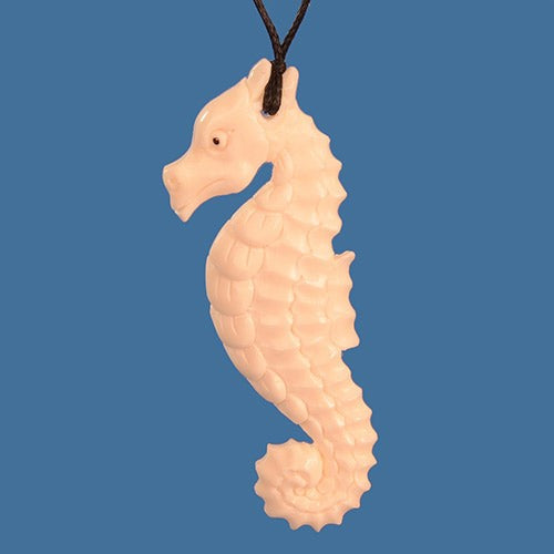 Handmade bone carved seahorse pendant necklace featuring intricate details and an adjustable black cord for a unique ocean-inspired accessory.